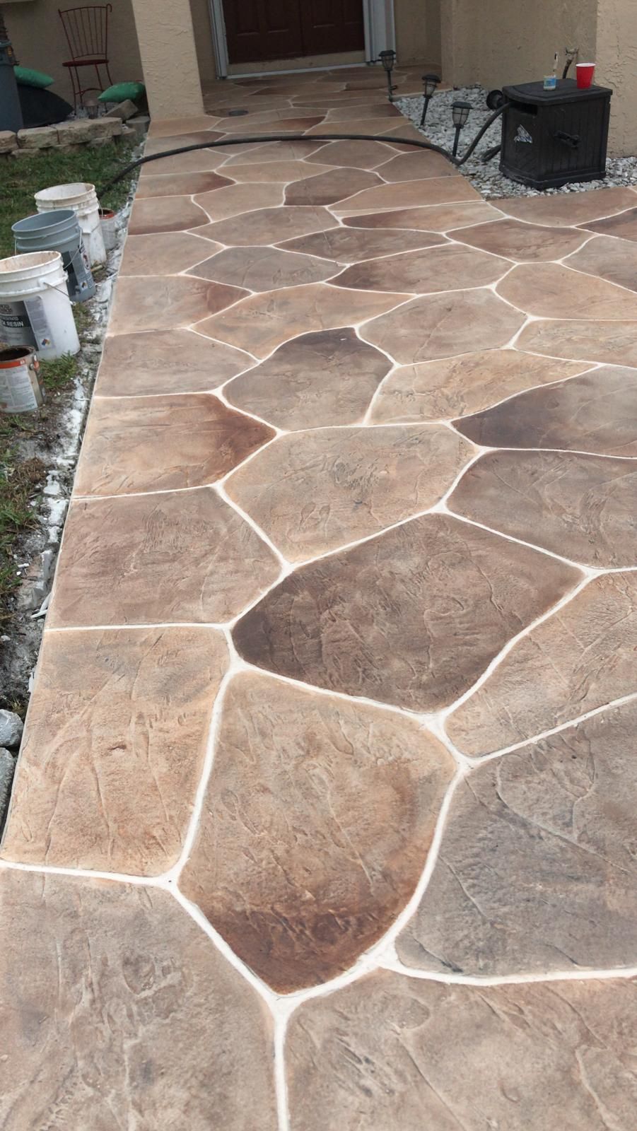 A Concrete Walkway that Looks Like a Stone Walkway.