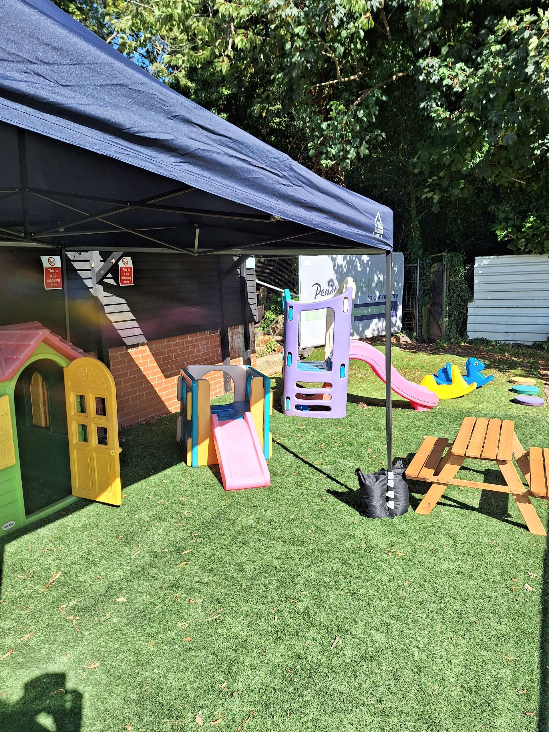 Outdoor play area at Pendley Day Nursery