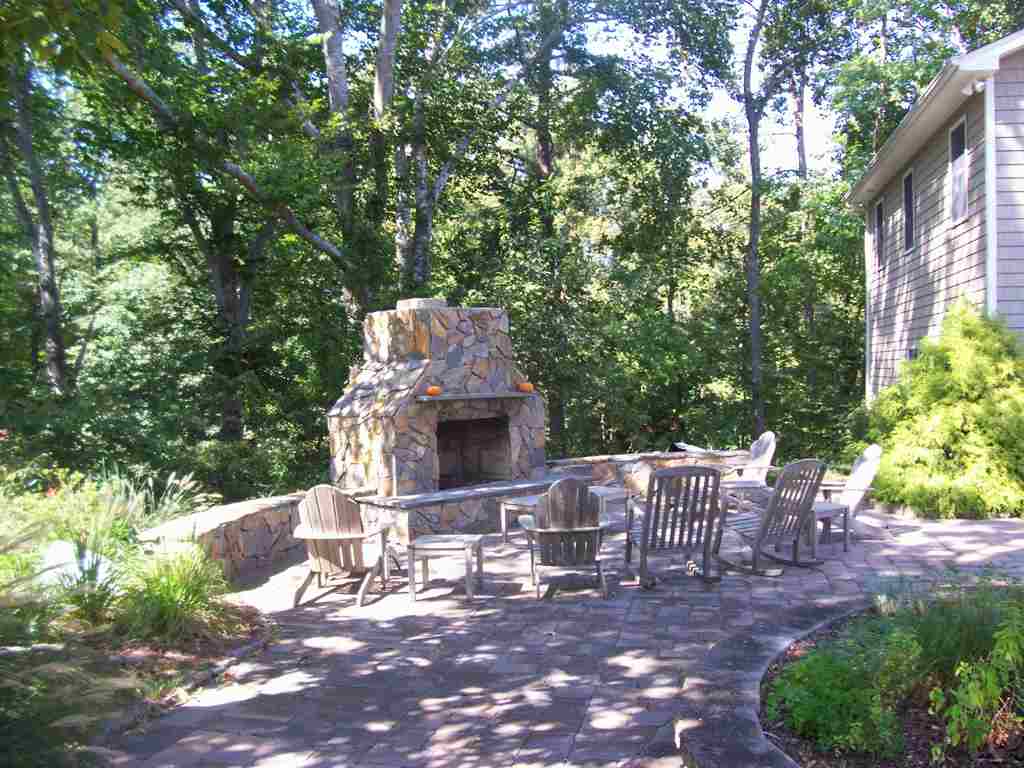 Retainer Walls — Fire Place Outside With Surrounding Trees in Shacklefords, VA