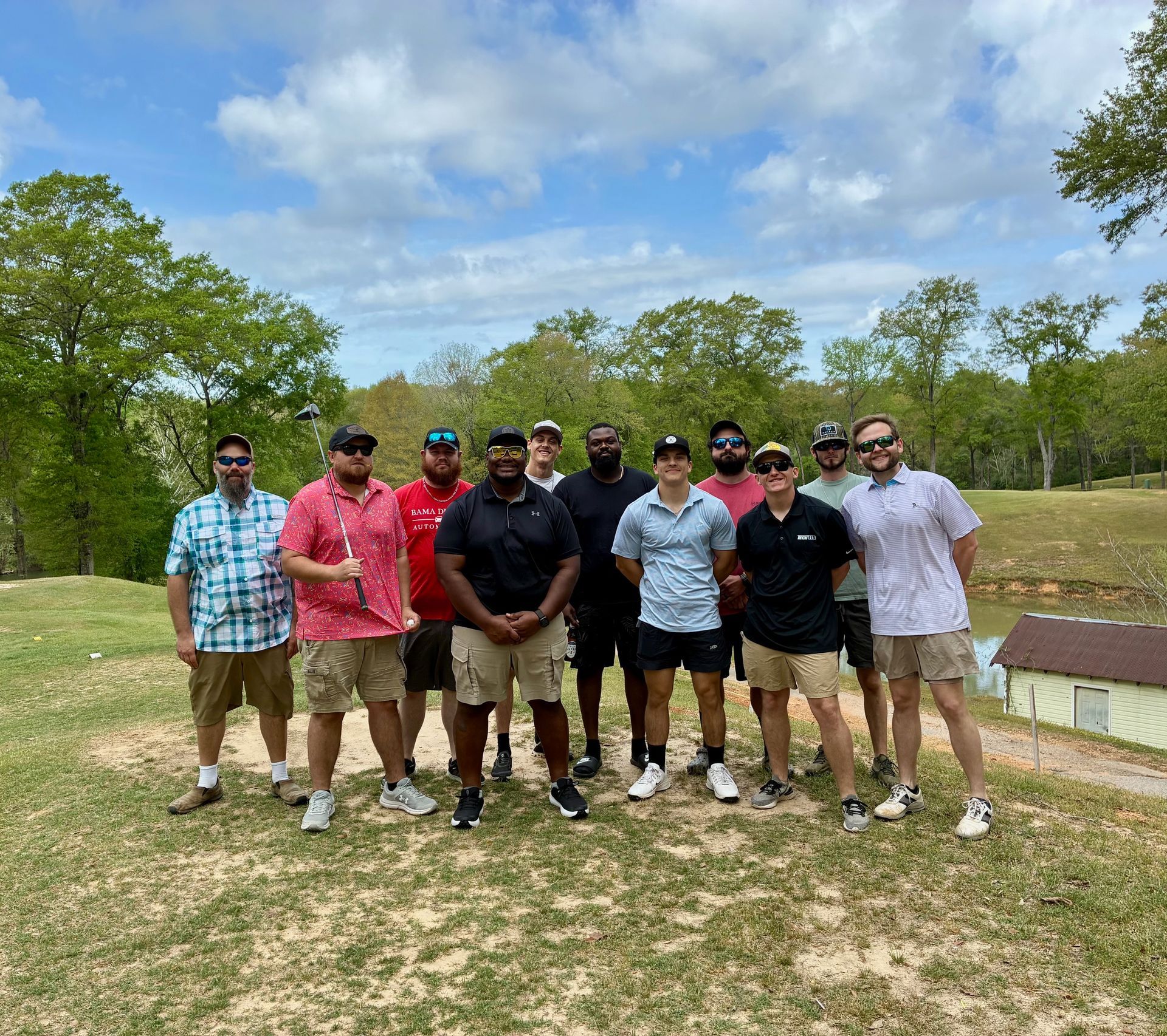 Cars parked in front of a brick building with 