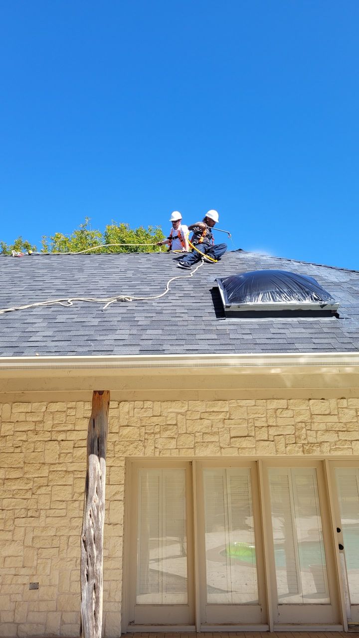 Roofer installing metal sheet roof — Alvarado, Texas — Roof Regen LLC.