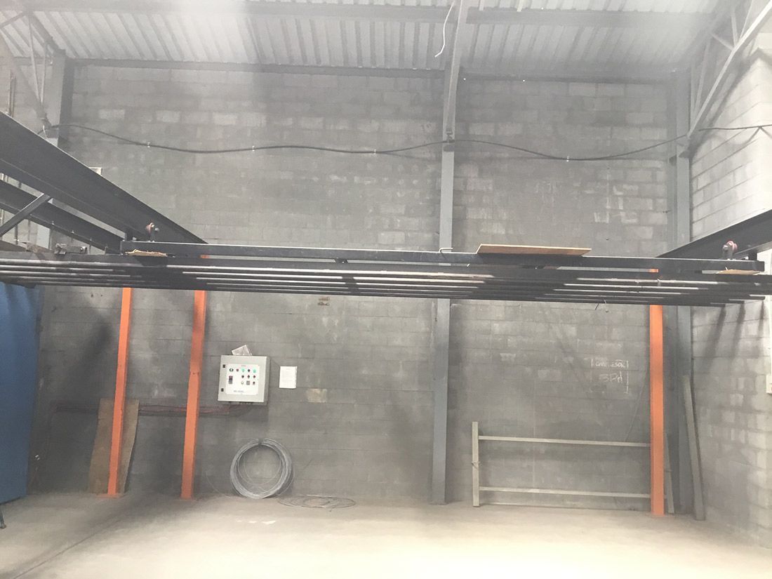 A Warehouse With a Ceiling That is Very High and Empty — Hastings Valley Powdercoaters in Port Macquarie, NSW