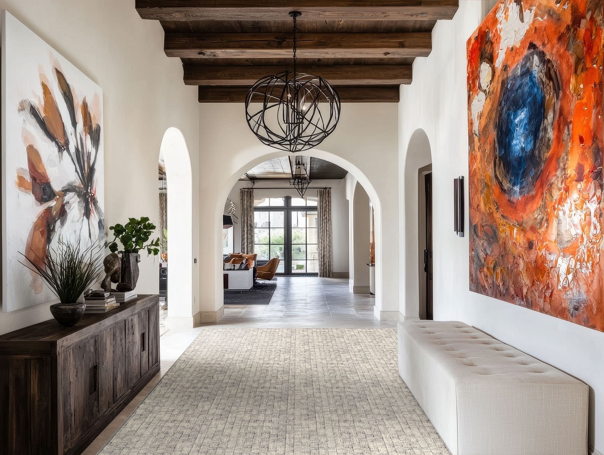 Hallway with arched doorways, exposed wooden beams, and colorful artwork.