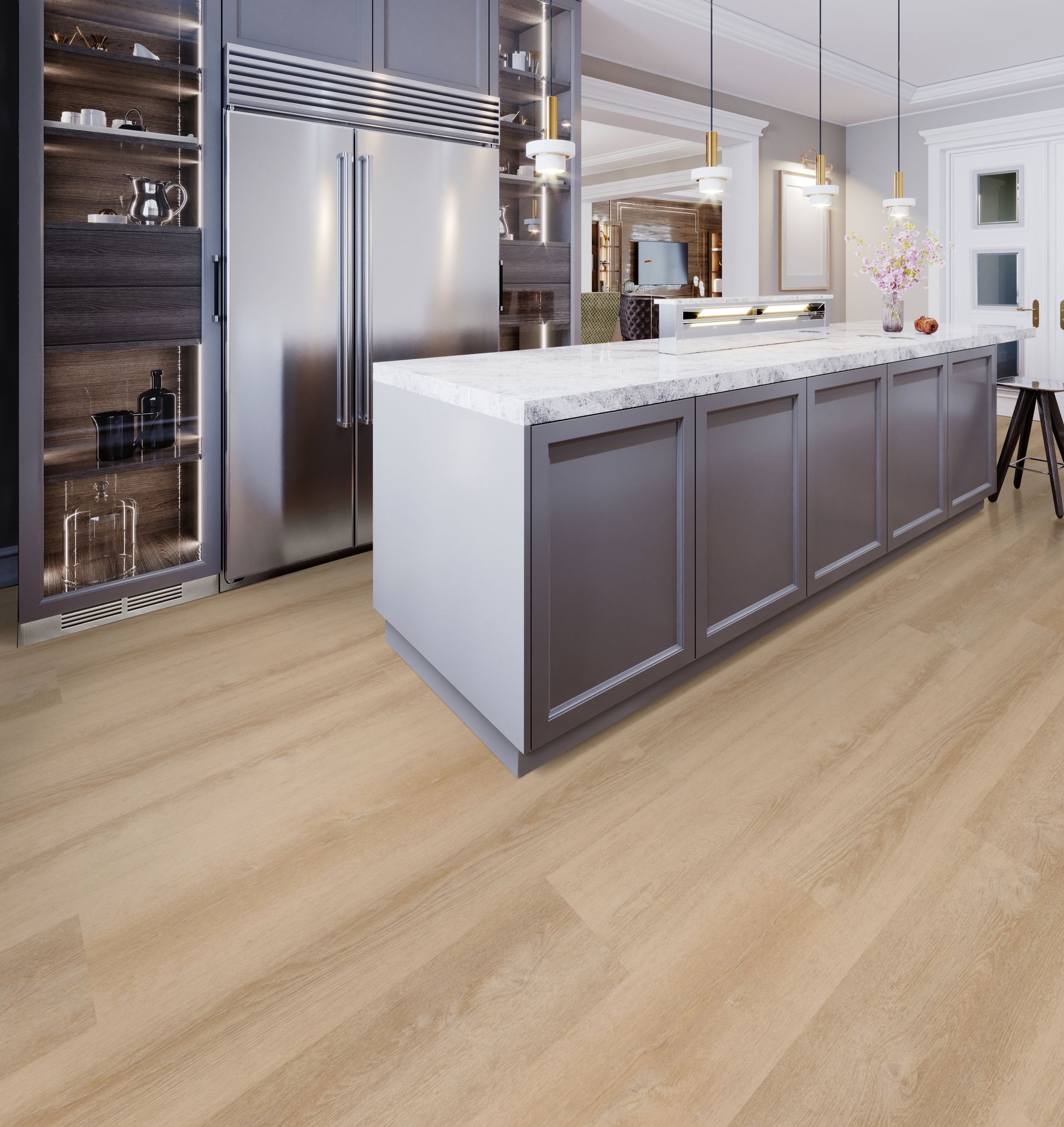 Modern kitchen with stainless steel fridge, white island, dark cabinets, and light wood flooring