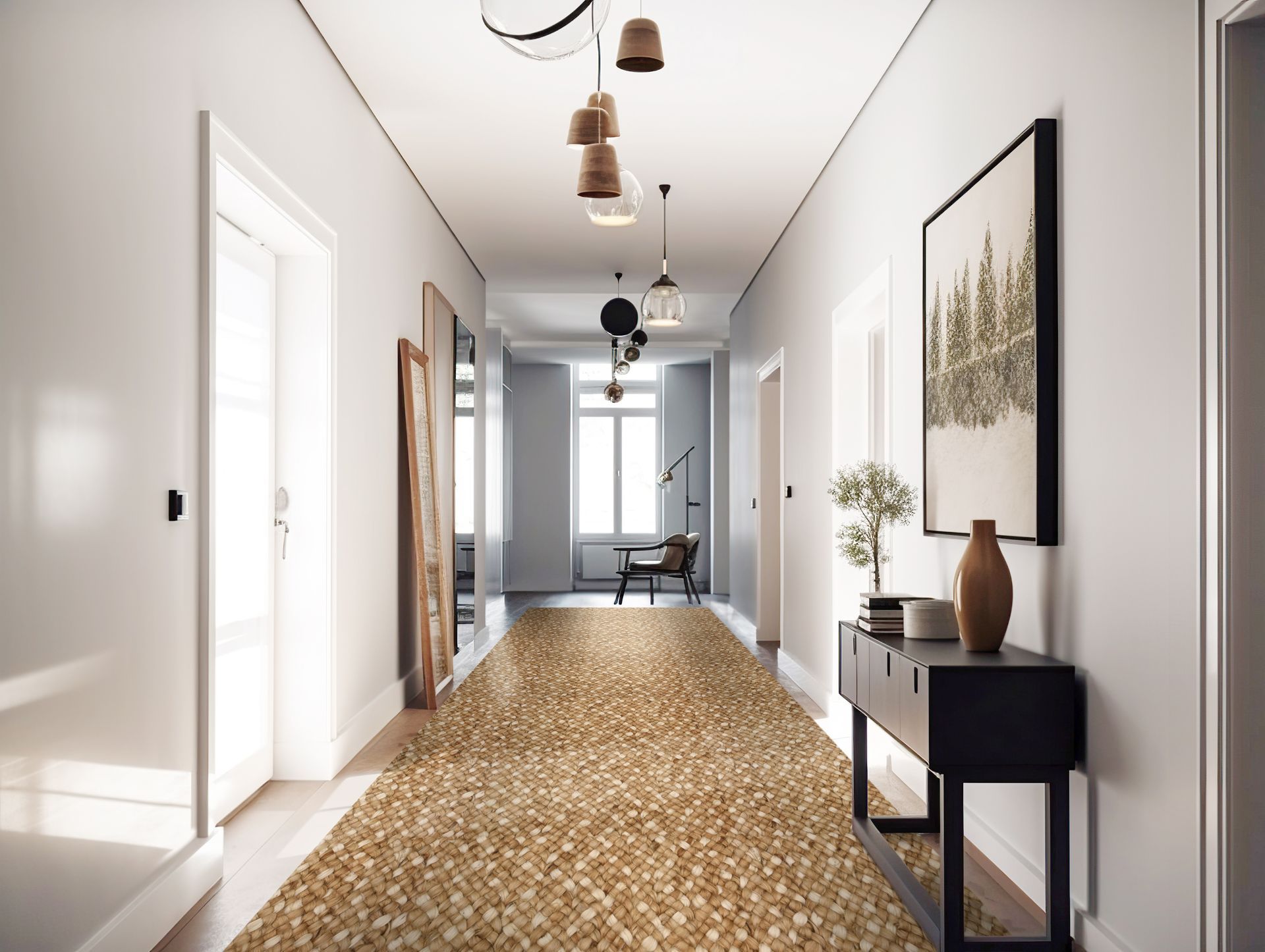 Long hallway with neutral walls, golden rug, and modern decor.