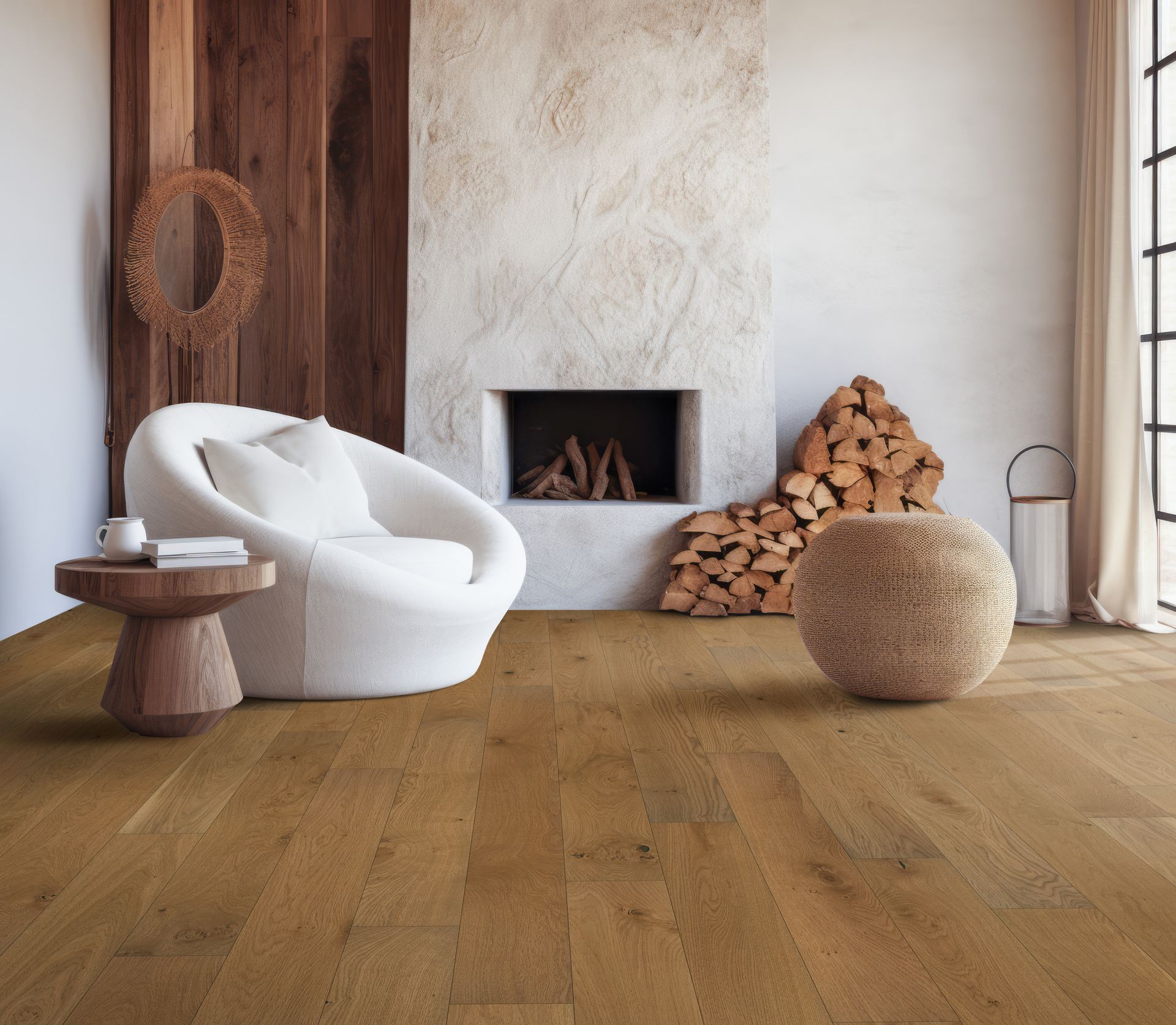 Cozy living room with wood flooring, fireplace, white chair, and wooden accent wall.