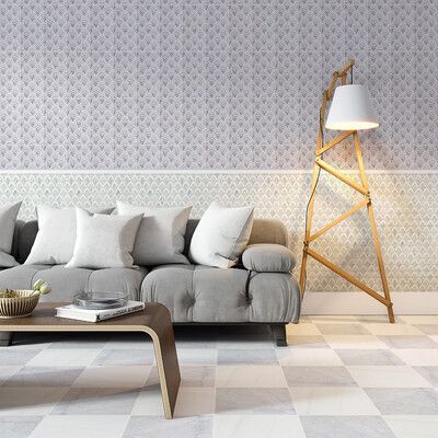 Living room with gray sofa, patterned wallpaper, wooden floor lamp, and checkered floor.
