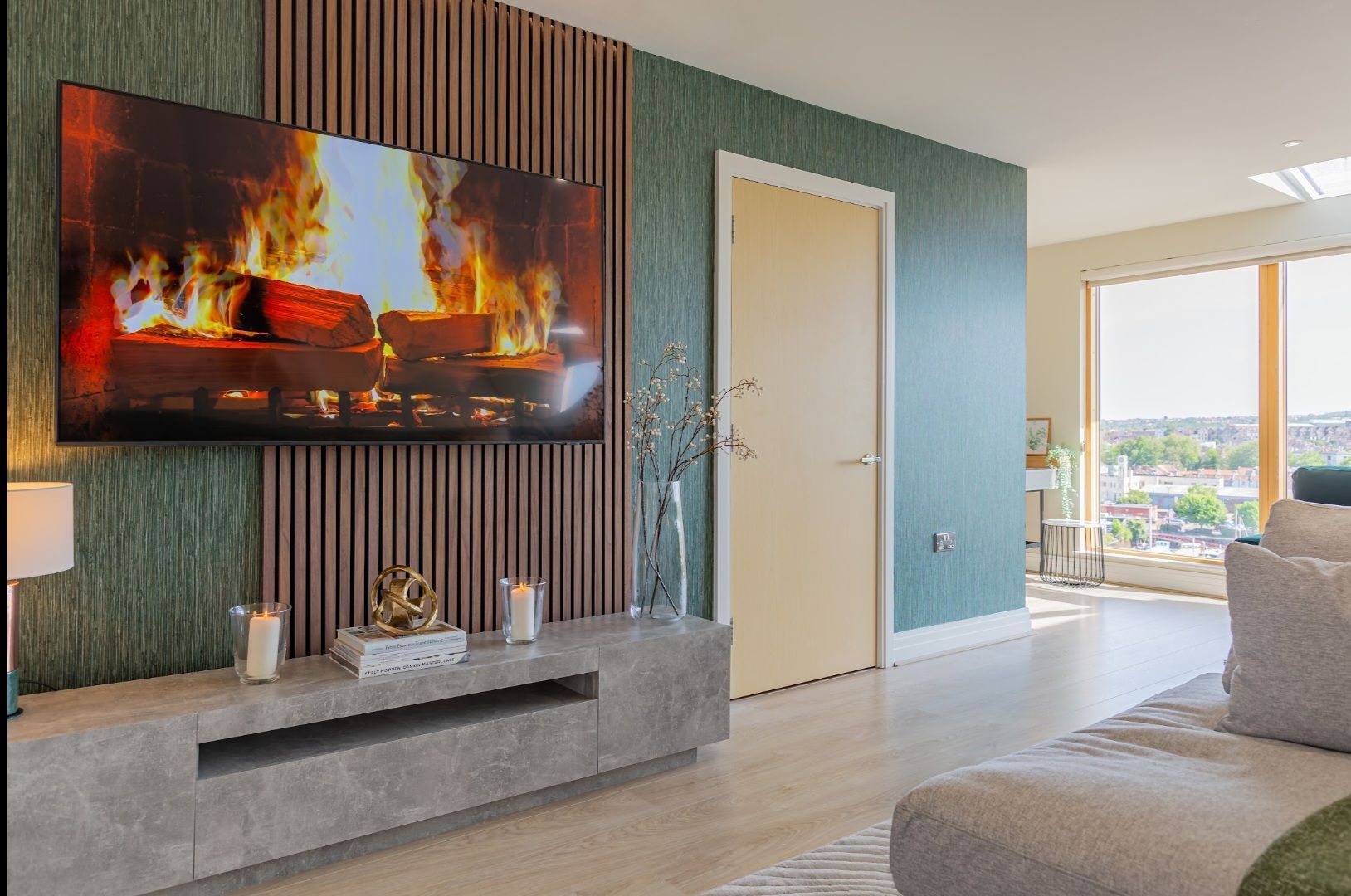 Living room feature wall paper and panel slats with wall mounted tv