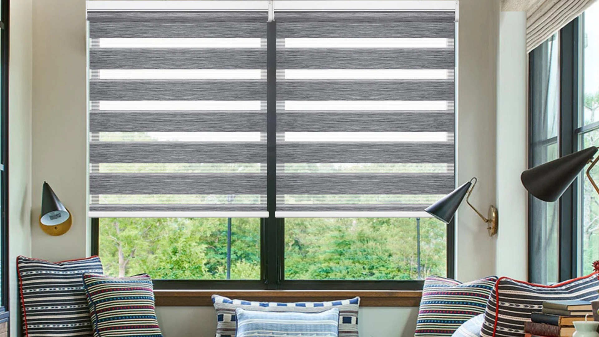 Motorized blackout roller shades – master bedroom – Rancho Cucamonga
A living room with a large window and a striped blind.