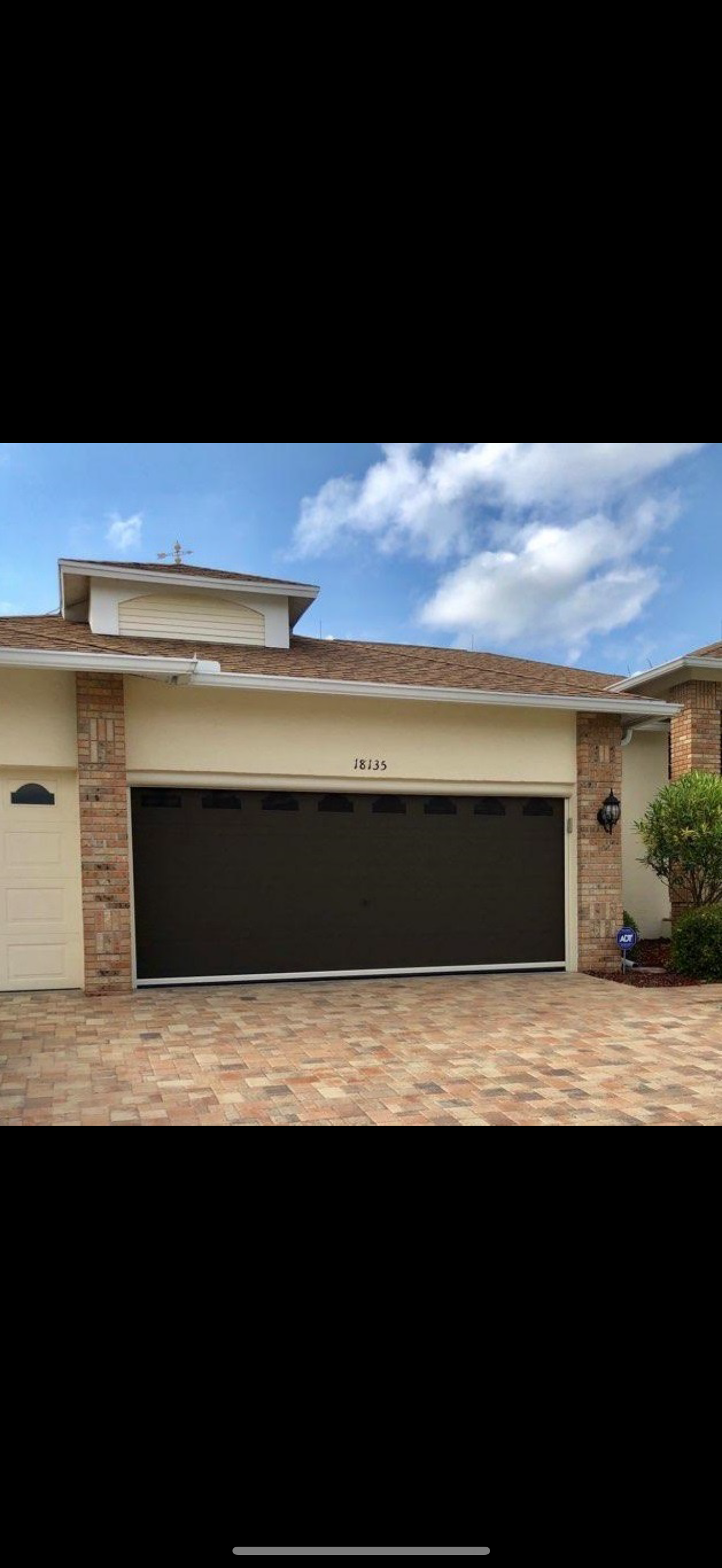 Custom poly plantation shutters – Chino Hills
A house with a large garage door and a brick driveway.