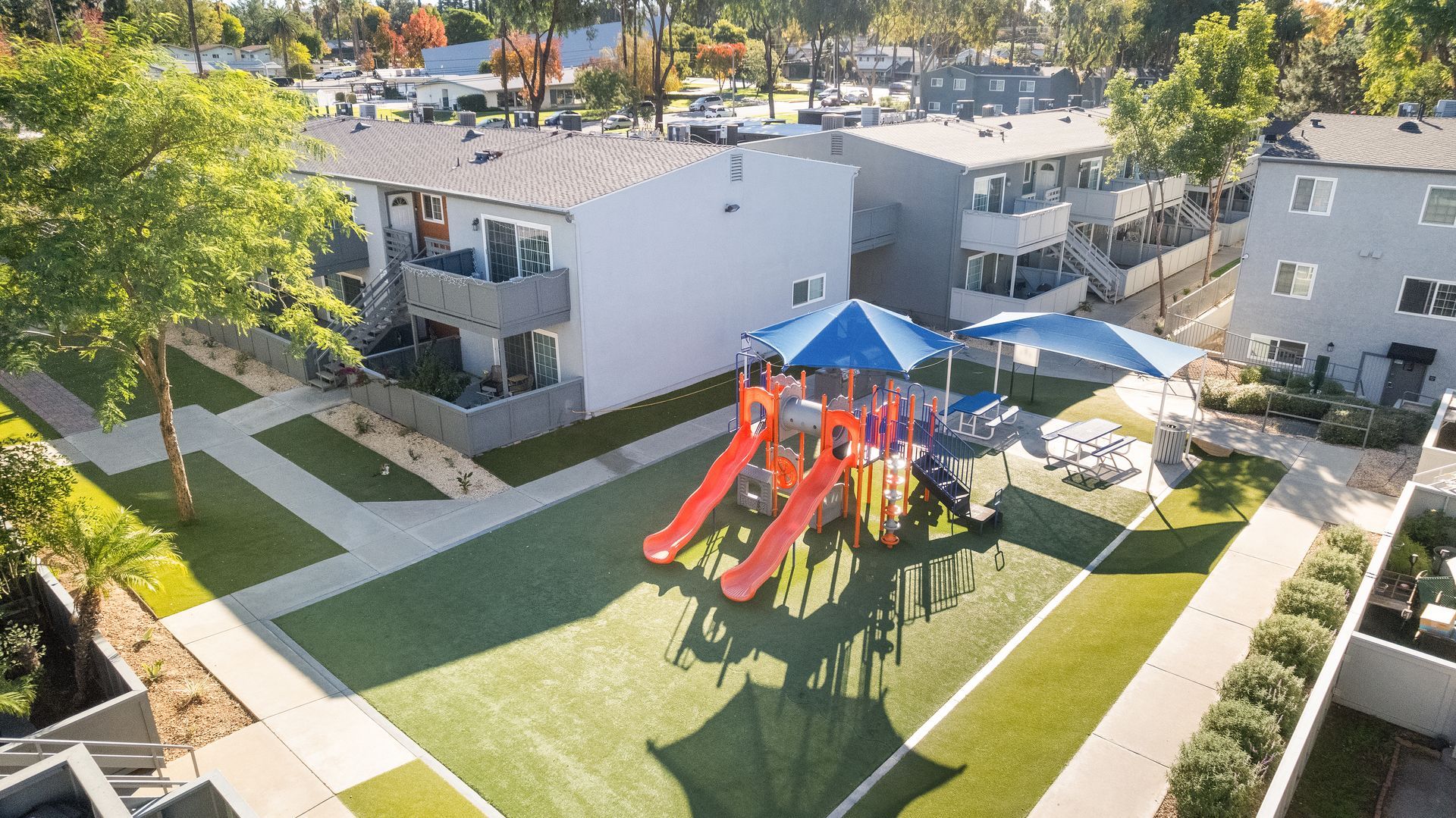 overhead view of apartment exteriors and playground