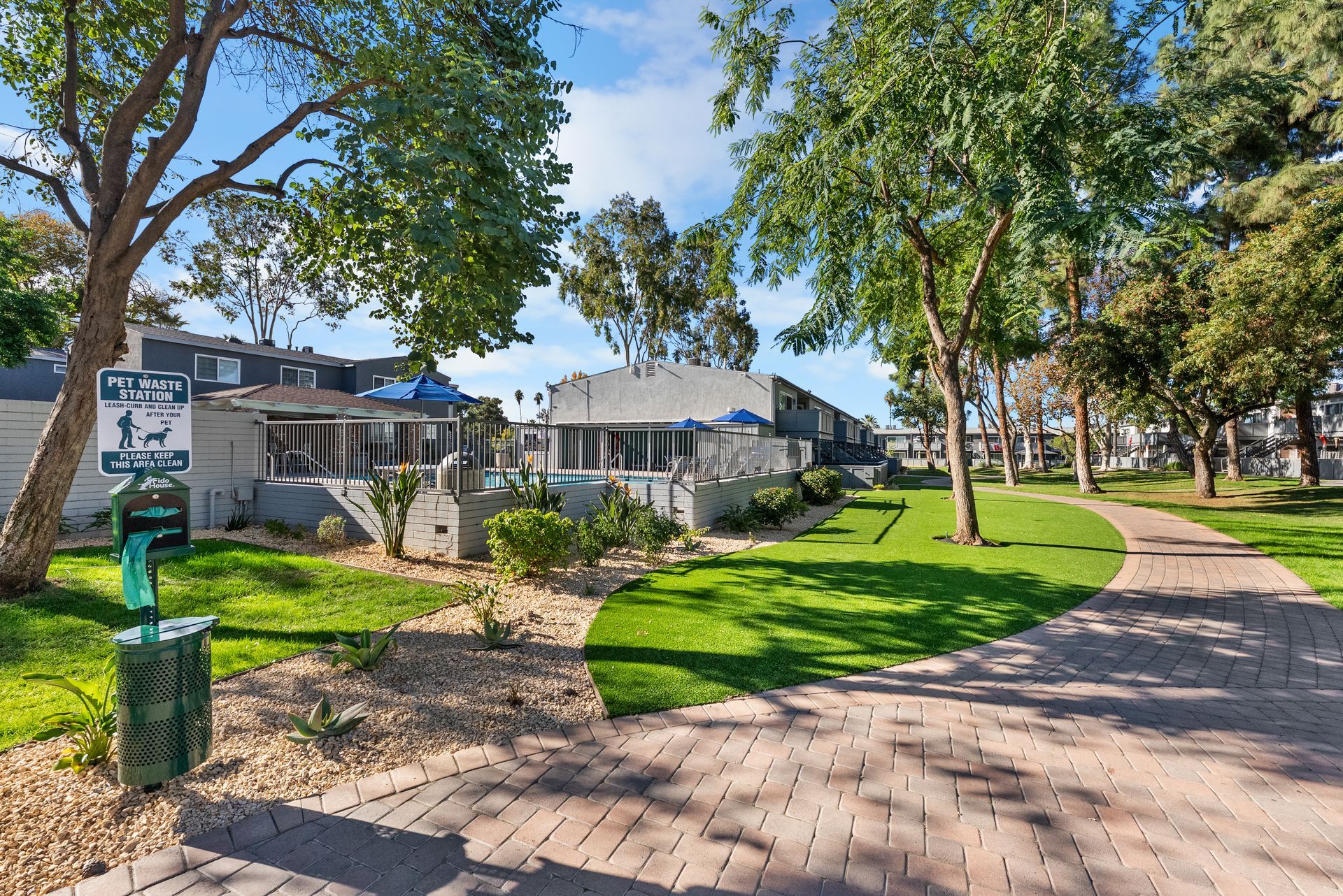 Shaded courtyard with apartment exteriors