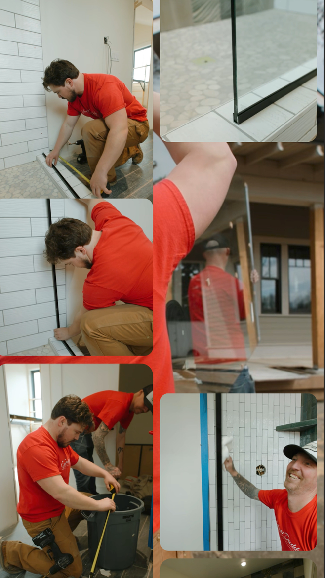 A man in a red shirt is measuring a wall with a tape measure