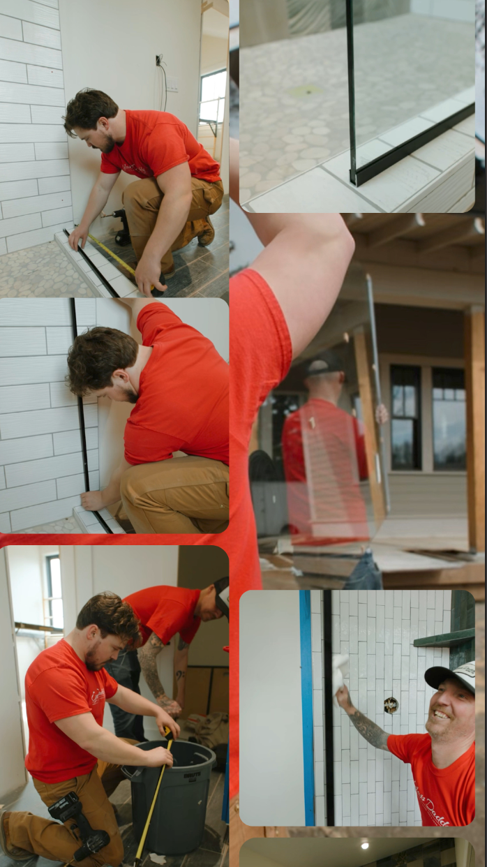 A man in a red shirt is measuring a wall with a tape measure