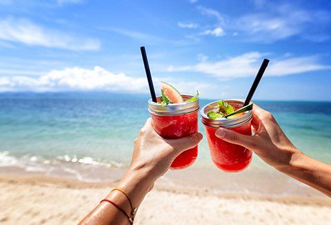 People Holding Drinks — Orlando, FL — Pro Vacation Group