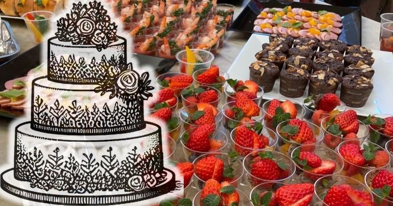 Dessert table with tiered cake, strawberries in cups, cupcakes, and other treats.