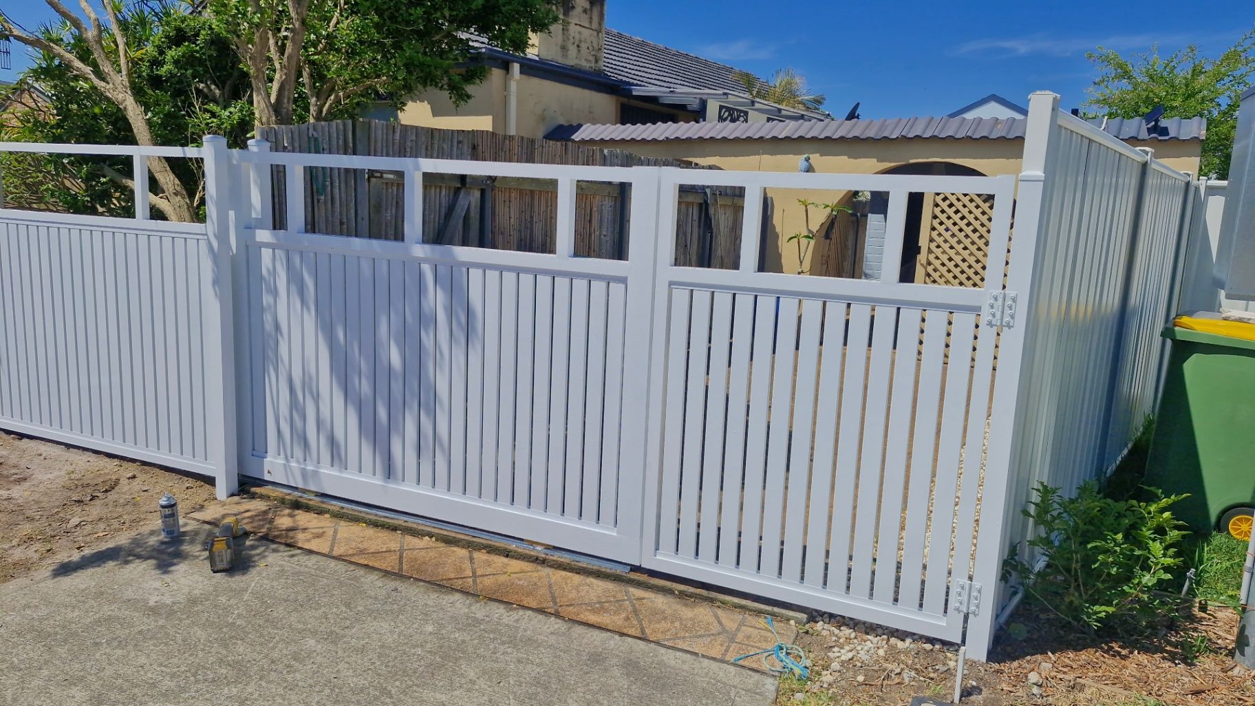 White Picket Fence and Gate in Front of a House — Strike Fencing & Gates In Umina, NSW