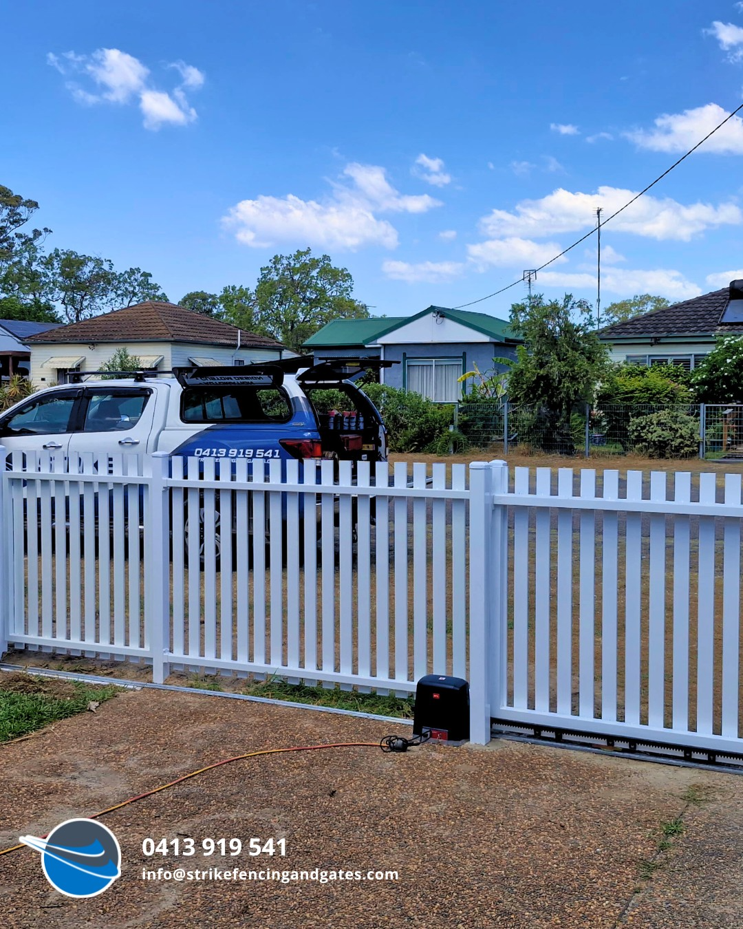 White Picket Fence With a Vehicle Parked Behind It — Strike Fencing & Gates In Davistown, NSW