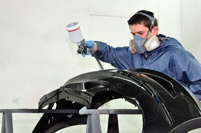 Automotive collision repair and refinishing