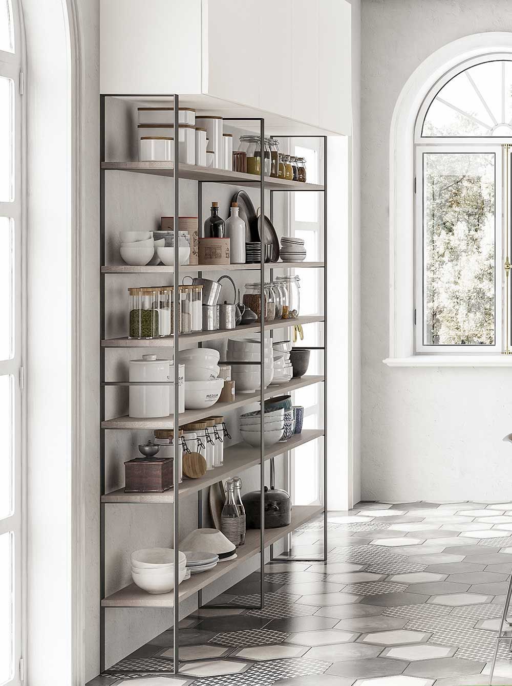 cucina moderna con molti scaffali vicino a una finestra.