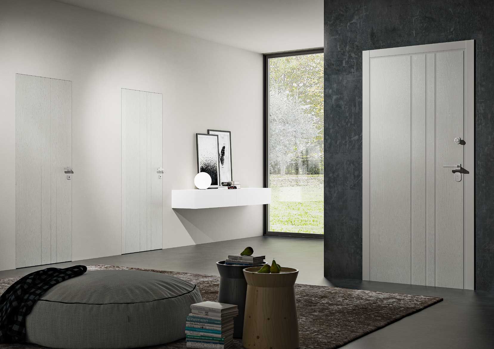 soggiorno con porte bianche e una grande finestra