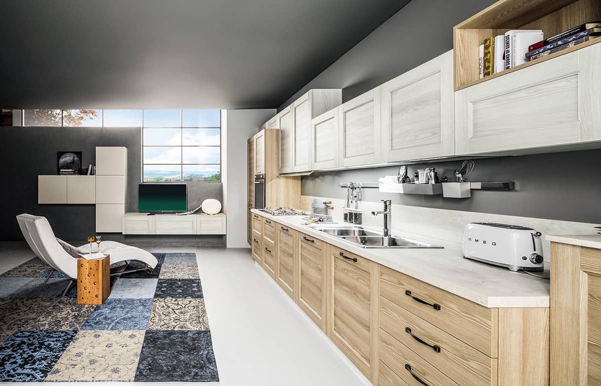 cucina-soggiorno con mobili in legno e ripiani bianchi