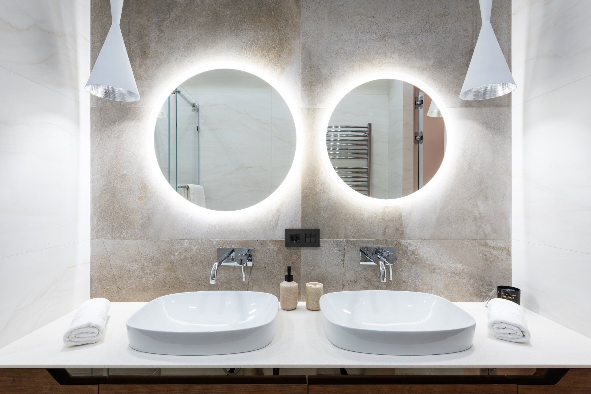 Two circle mirrors with backlighting