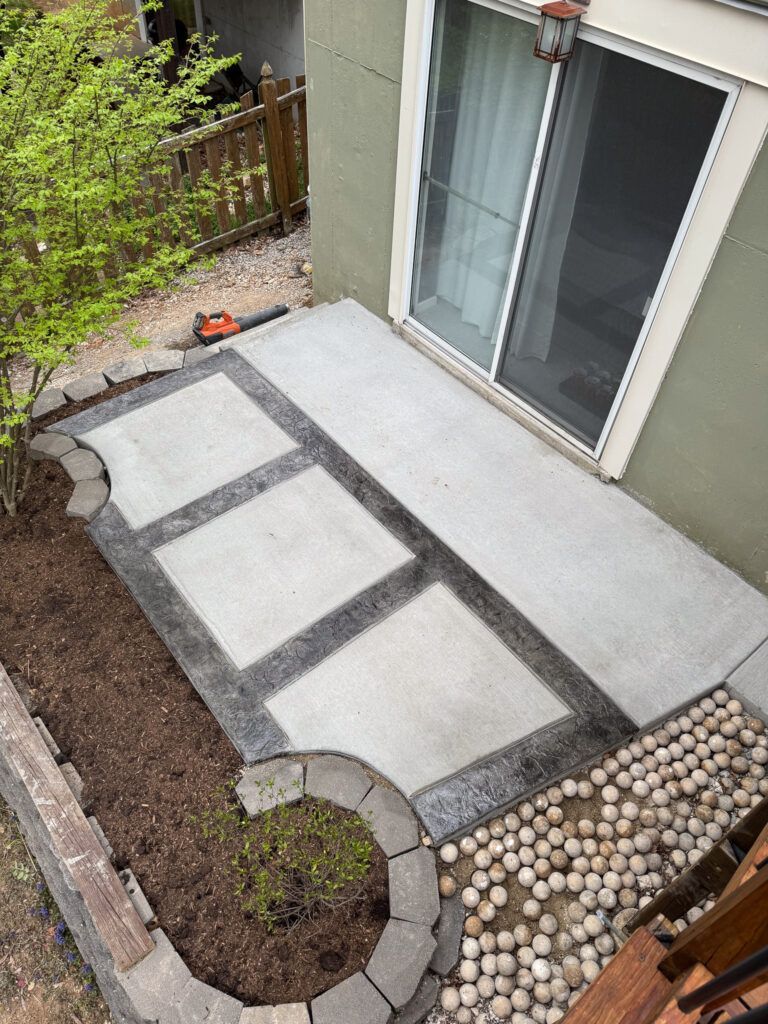 An aerial view of a patio with a sliding glass door.