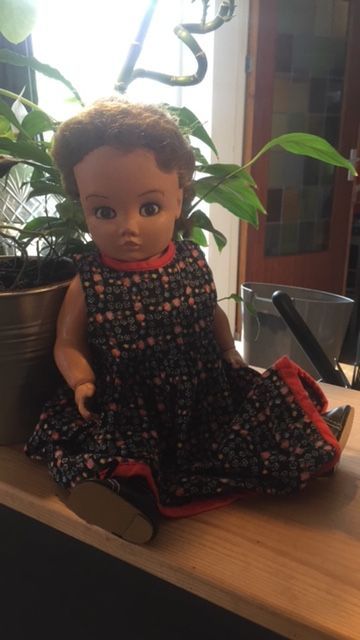 Popje met nieuwe kleertjes