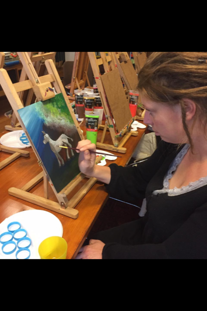 Geschilderde ezel op een schildersezel