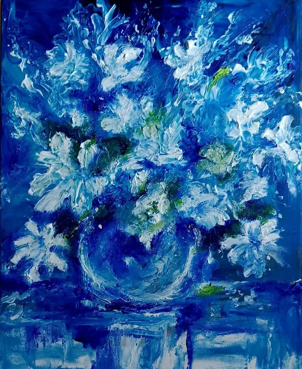 Blue floral painting of white and blue flowers in a vase on a blue surface.