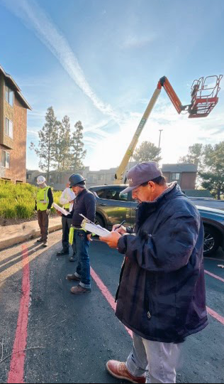 EmpireWorks team member on clipboard