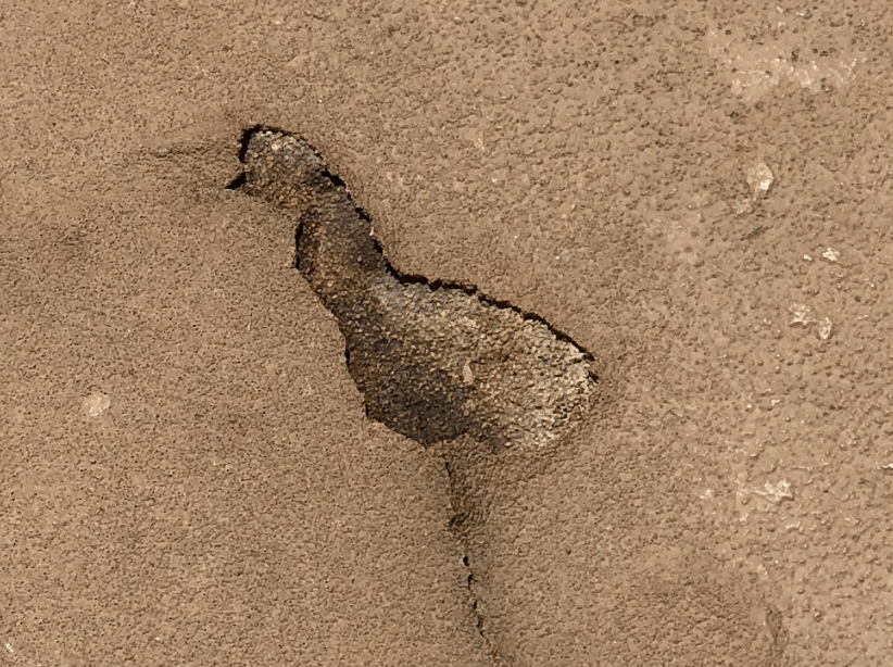 Damaged balcony with a piece missing