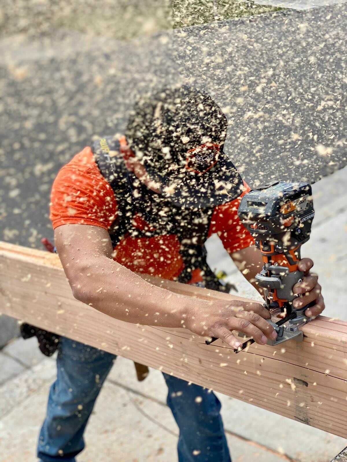 Man Cutting Wood