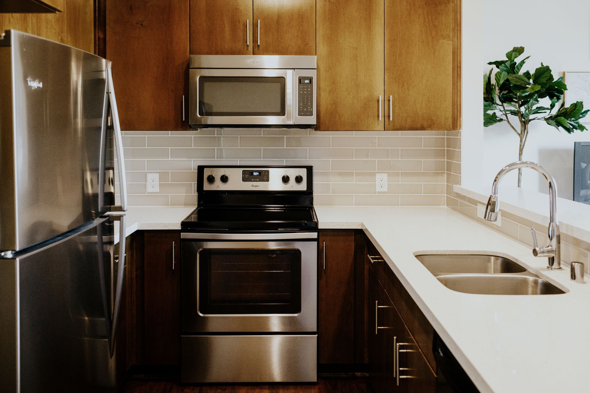 Modern Kitchen with subway tile and stainless steel appliances