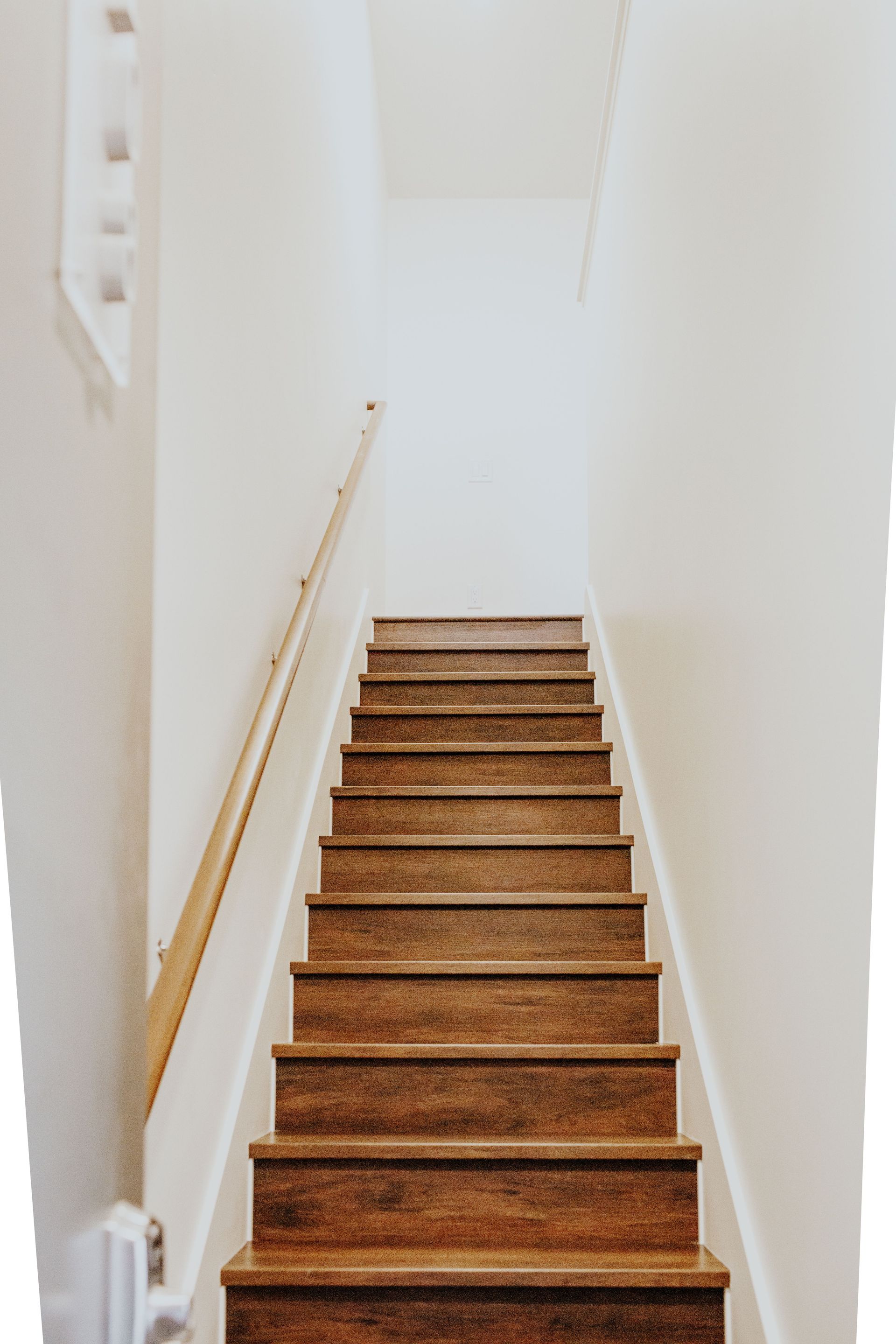 Loft staircase with vinyl wood plank steps