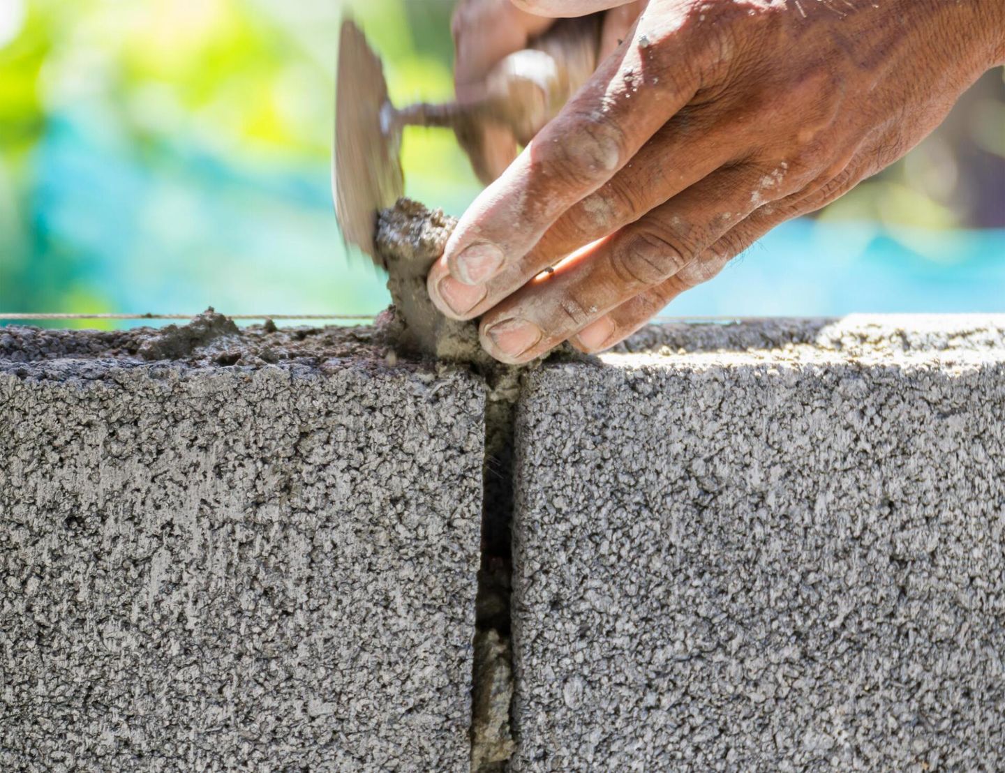 man working on a wall