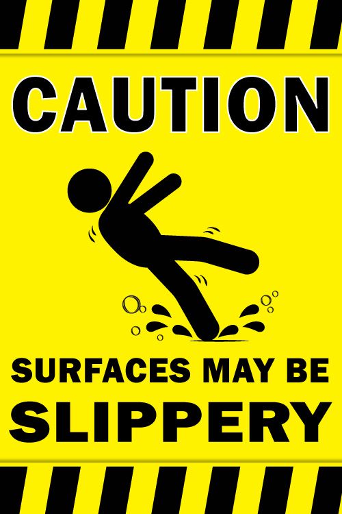 A yellow sign that says caution surfaces may be slippery