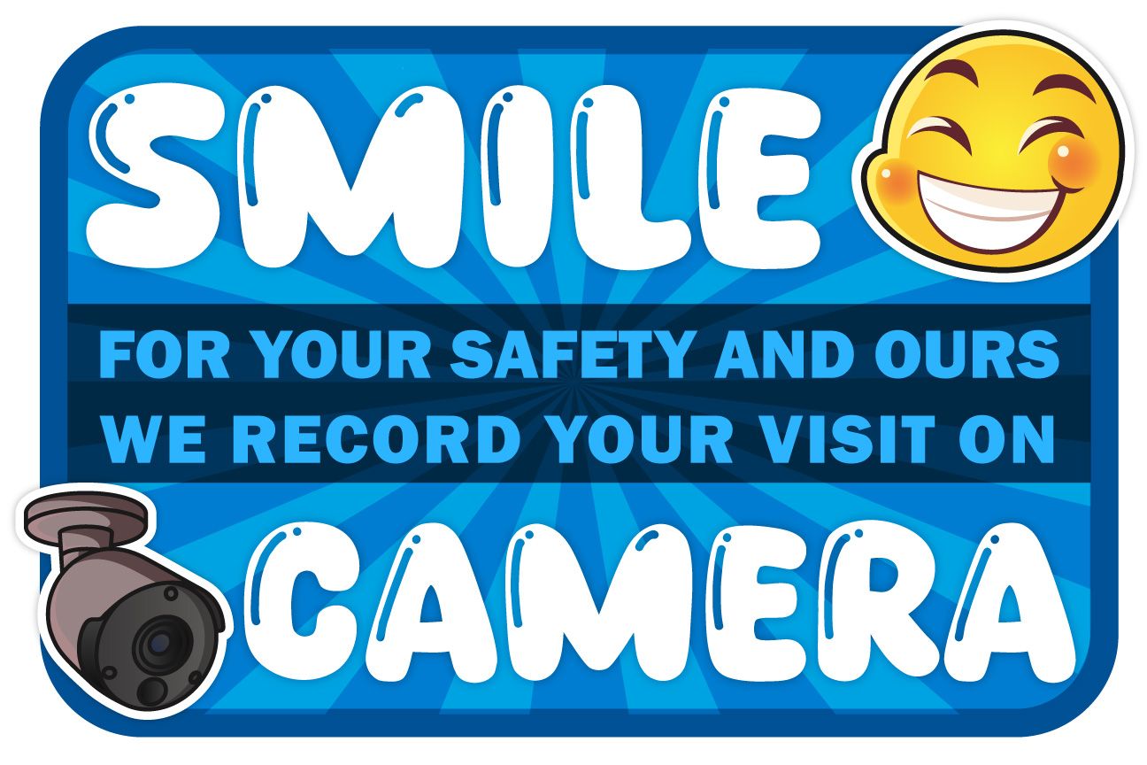 A sign that says smile for your safety and ours we record your visit on camera