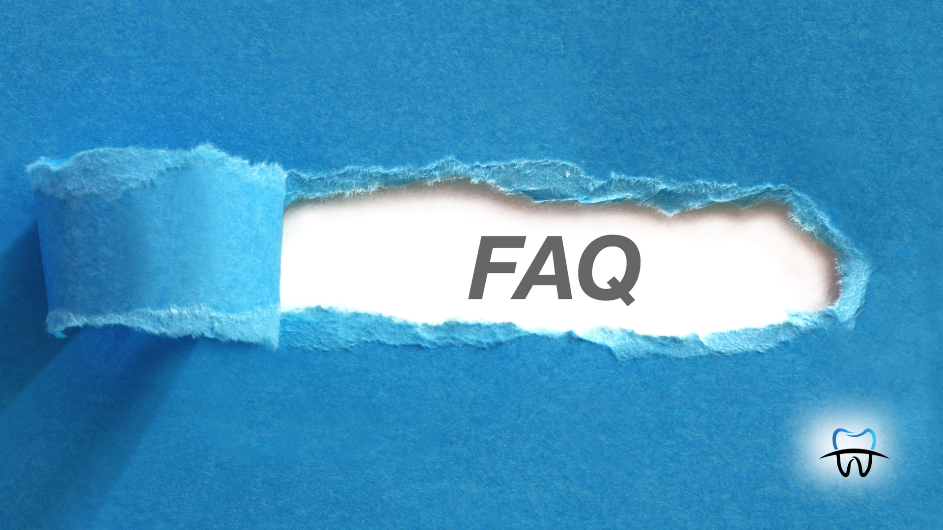 Blue paper torn open reveals the word 