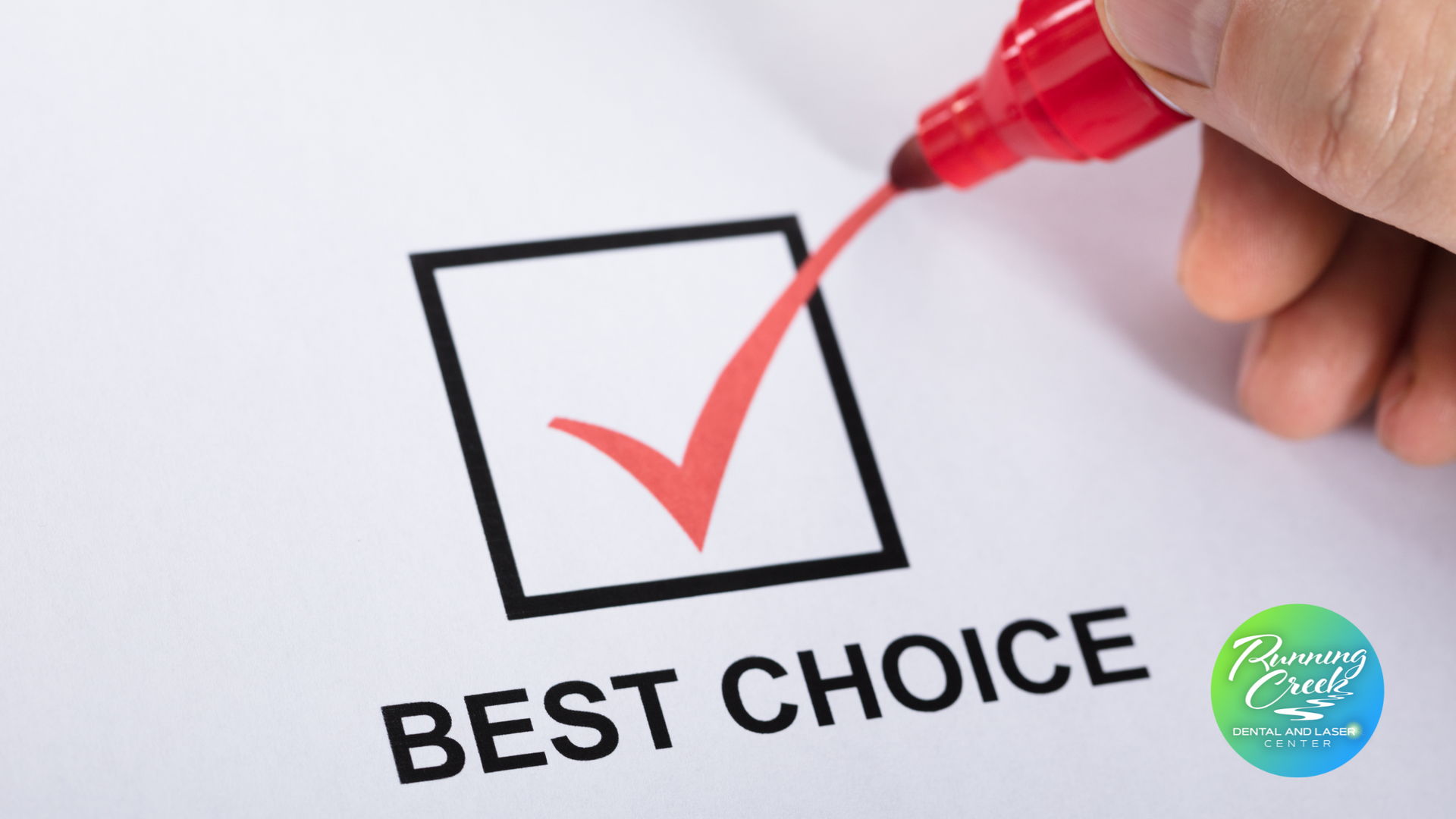 A person is writing the word best choice on a piece of paper