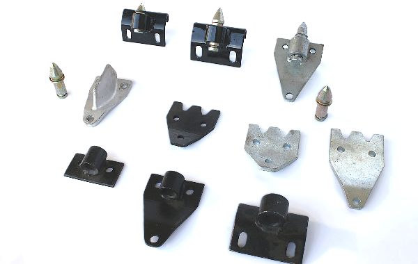 A bunch of metal parts on a white surface