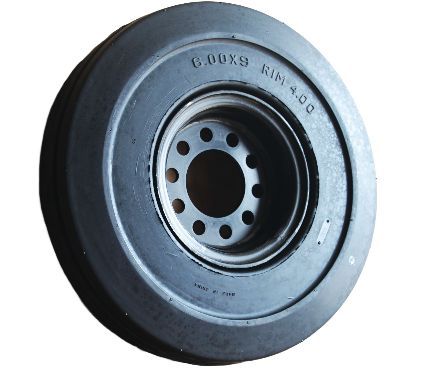 A close up of a black tire on a white background