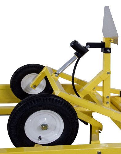 A close up of a yellow vehicle with white wheels