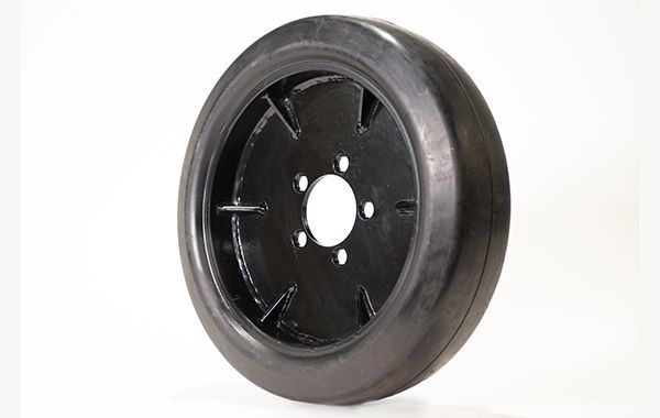 A black wheel with a hole in the middle on a white background