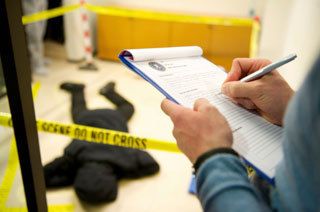 taking notes on a crime scene