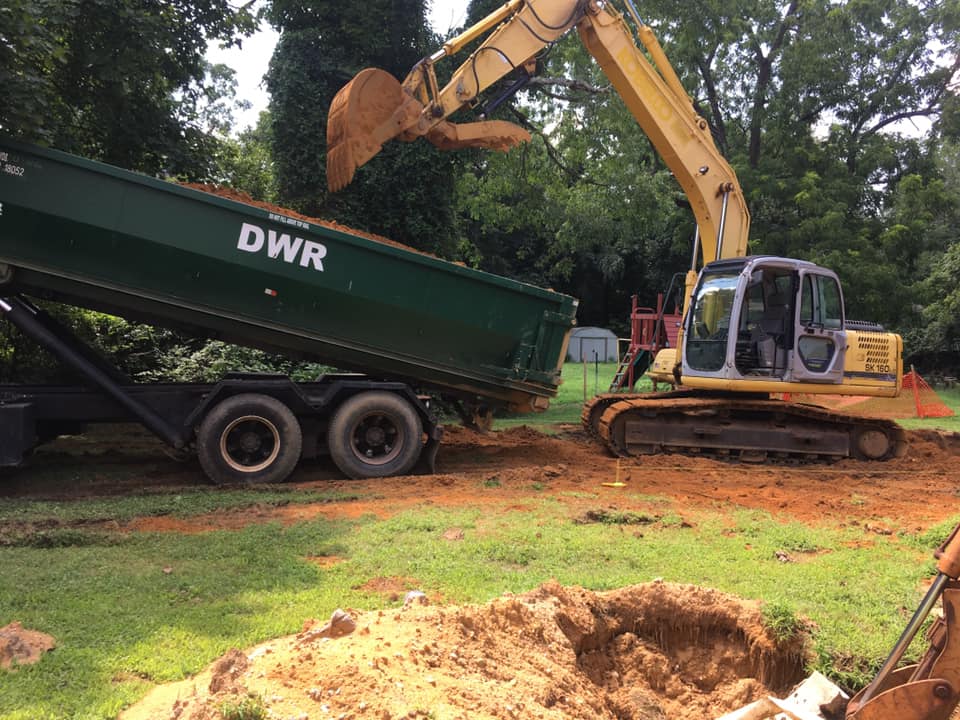 Digging Up the Septic System — Newfield, NJ — Del Monte Waste Removal