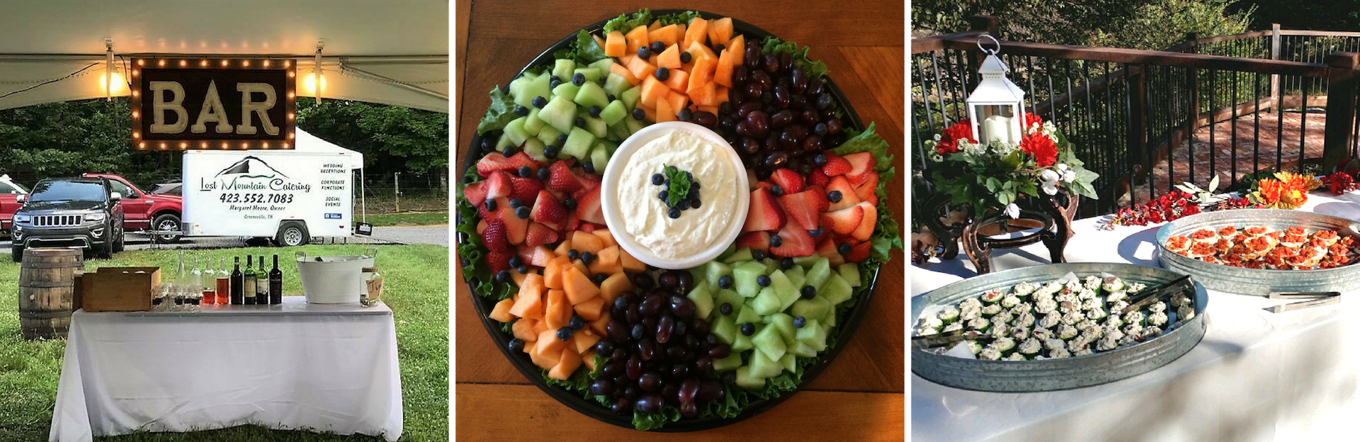 Outdoor catering setup with bar sign, fruit platter, and buffet tables in a garden setting