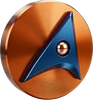 A copper-colored circular base features a blue, arrow-shaped metallic emblem with a small sphere in its center.