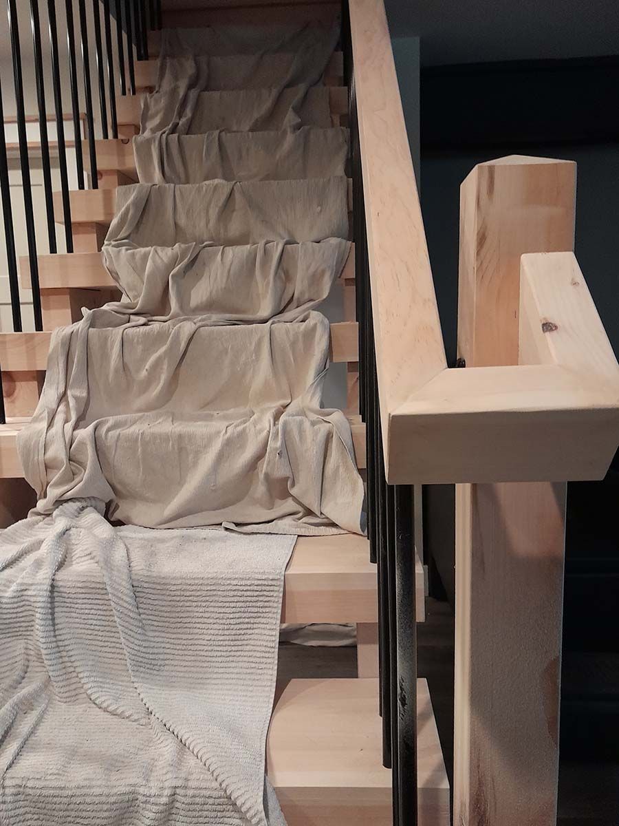 A durable wooden staircase for interior renovations.